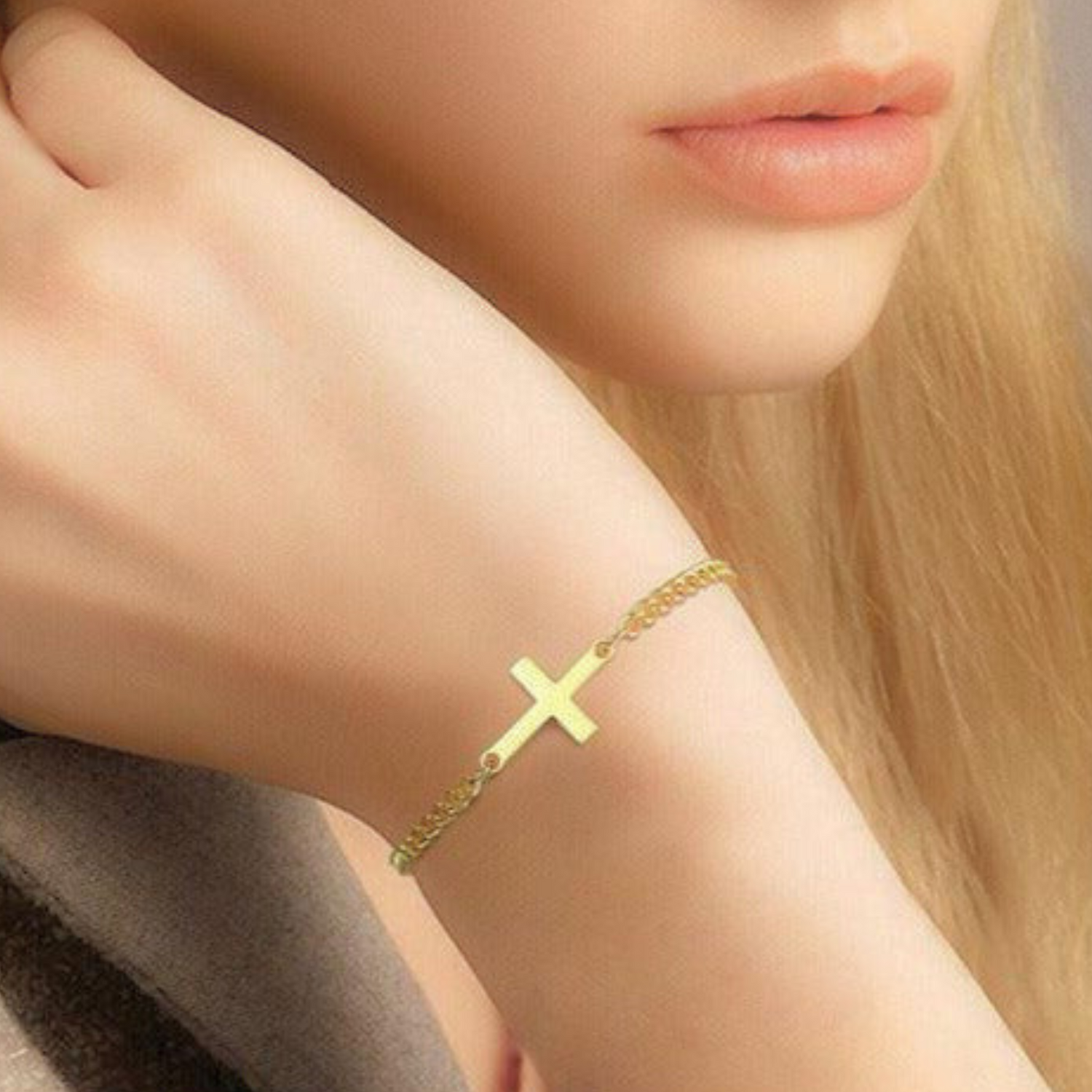 Lady wearing a Cross Bracelet on her wrist. Promoting our Christian Bracelet collection